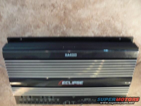 Eclipse XA4000 car audio amplifier with silver fins and black top