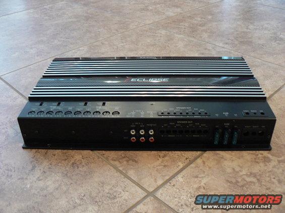 Car amplifier with 'ECLIPSE' logo and various input/output terminals