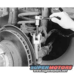 tre3.jpg Use a tie rod end puller tool to remove the ball stud from the Pitman arm 