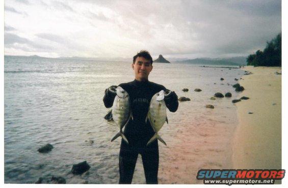 Kai Kondo with the world famous Chinaman's Hat in background. For more, visit Kai's site at kondogyotaku.net to purchase authentic Japanese fish prints.