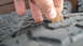 1988 Ford Bronco - Penny inserted into tire tread to check depth. The tread appears to be above Lincoln's head.