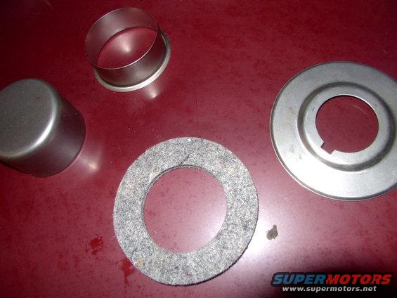 balancer snout repair sleeve. At almost 30 years old the balancer is bound to have a groove worn into it, by the seal. You have to buy the early style oil slinger, on the right, from Mopar separately. 