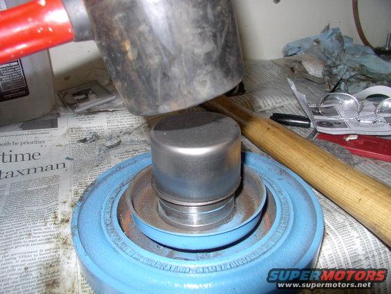 Pound new repair sleeve onto balancer snout AND......