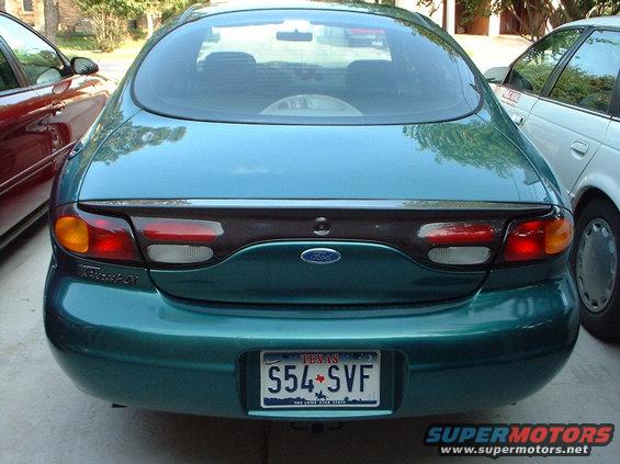 Teal 1996 Ford Taurus rear with Texas license plate S54 SVF