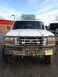 1992 Ford C-350 (Centurion Conversions) - This 1992 Ford C-350 Centurion Conversions truck is equipped with a winch and brush guard.