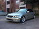 2008 Subaru Legacy - A silver Lexus IS300 sedan is parked in a lot with a brick building in the background.