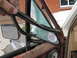 1981 Ford Bronco - Removing the rubber seal from a cracked vent window on a vehicle.