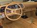 1982 Chevrolet Camaro - The interior of a 1982 Chevrolet Camaro shows a tan dashboard, steering wheel, and center console.