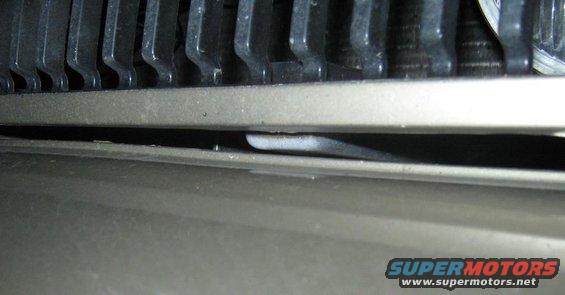 Close-up of 2000 Mercury Grand Marquis grille and bumper detail
