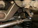 1995 Ford Bronco - Undercarriage view shows suspension parts including springs and steering linkage.