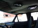 1993 Ford C-150 (Centurion Conversions) - Interior of a 1993 Ford C-150 (Centurion Conversions) showing the headliner, rearview mirror, and dashboard.
