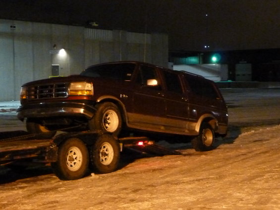 Dark red SUV on trailer, 1992 model year