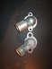 2000 Mercury Grand Marquis - Two automotive water neck housings are shown against a dark background.