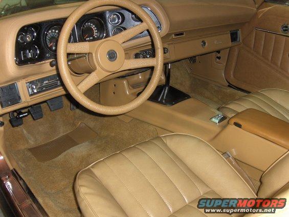 1979 Chevrolet Camaro interior with tan seats, dashboard, and steering wheel