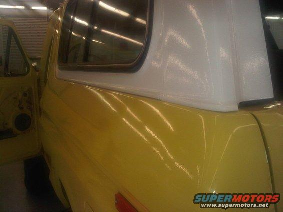 Yellow 1978 Ford Bronco with white removable top, 3q-front view