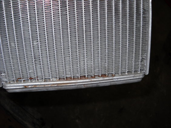 Heater core with visible rust on the bottom edge