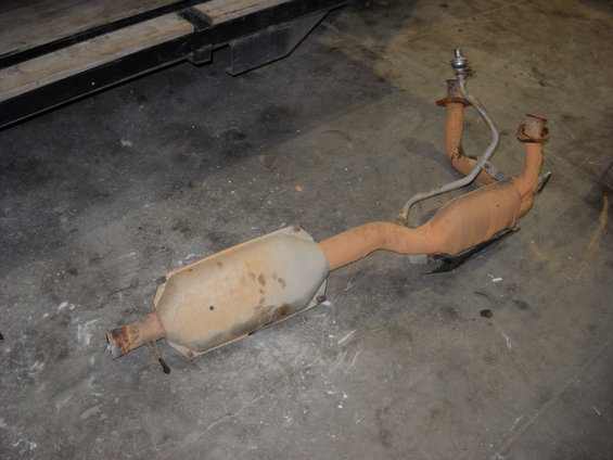 Exhaust system part with catalytic converter and oxygen sensor