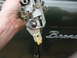 A new lever was cut from a steel plate and drilled for the pivot & operating rod.  A short sleeve wa...
