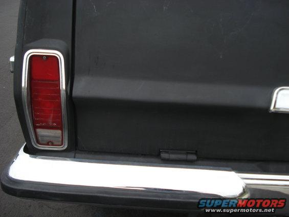 1977 Jeep Cherokee rear corner showing taillight and chrome bumper