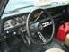 1977 Jeep Cherokee - The interior of a 1977 Jeep Cherokee shows its dashboard, gauges, and a red jerry can.