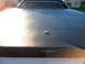 1973 Ford Ranchero - Trunk lid detail with a T emblem. The album claims 1973 Ford Ranchero, but this is incorrect.