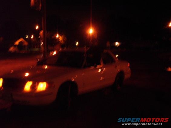 1999 Ford Crown Victoria, 3q-front view at night