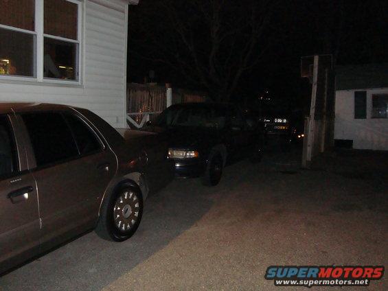 In front of my parents Chevys.