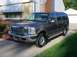 2002 Ford Excursion - All cleaned up next to the house