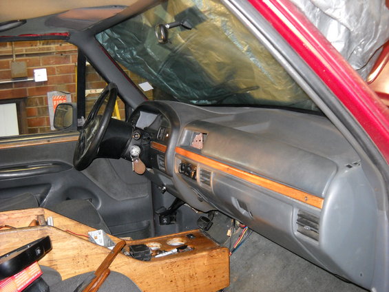 Interior dashboard with wood trim and aftermarket center console