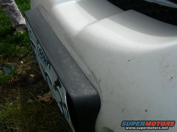 Deflection in the bumper from the hit.  Really screwed up my 200k mile paint.