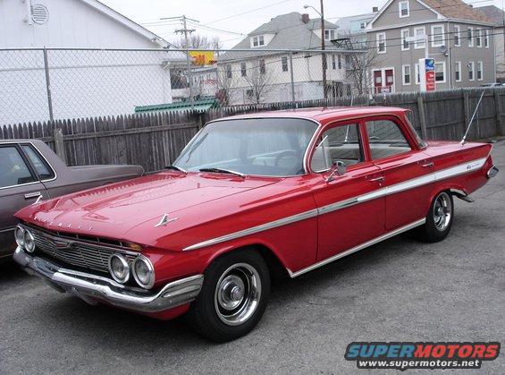 1961-chevy-impala.jpg bought for 1,000.00 When i bought this car it was almost kind of an acident. I seen a 1961 corvair at a car dealership i like big cars but you had to see this 1961 corvair, it was mint,very clean by chance i did'nt have any money on me, i just stopped to look at the covair, the guy wanted 3,000.00 so i said i going to go to the bank and get the money.I got hung up on the phone with my long lost son and you would not belive it by the time i got back(the guy sold the darn corvair) was'nt meant to be i guess, as i was standing there with jim the sales person his brother joe pulled into the lot with this drab gray 1961 all original chevy impala, i thought to myself,(NOW thats more like it) a big old chevy, the guy got out and came over to where i was to talk to his brother and when i could finaly get a word in i asked joe if he wanted to sell his impala, he said, NO WAY iv'e had this impala for 30 years its the first car i ever bought i love it no way do i want to sell her, so i left hanging my head, no new car today. there was somthing about the 1961 impala that i just could'nt get out off my mind so i went on a mission to fine one, well i looked and i looked, let me make clear this was before cuputers were mainestream it was back in 1980 at least i did'nt have one then, so i looked in classifids and car lots, well about 6 months later i got a telephone call at my home, i forgot that i gave joe from the car lot my number in case he ever changed his mind, well he did, he needed money real bad and i said well how much do you want for her, he said,,,,does a 1,000.00 sound like to much, i said, i'll be right there, i went to my uncles house and borrowed 500.00 and then to my sisters house to borrow 200.00 and i had 300.00 off i went, oh yea i forgot to tell you what he said, he said i have a suprise for you, he would;nt tell me over the phone. It did;nt take me to long to get to the car lot and there she was, the suprise was that he painted it RED whitch looks so much better than drab gray, so i said wow it looks great here is the 1,000.00 you aked for, all the sudden i got a tap on my shoulder it was his brother jim, the owner of the car lot, he said can i see you privatly, i said sure, we walked into his office and he said, how much is my brother selling that car to you for, i said 1,000.00, he said....(COME ON NOW) you and I know that car is worth alot more than 1,000.00 it all original and has hardly any rust and i'm the one who painted it for (MY BROTHER) just 3 months ago, that cost 200.00 alone, my brother don't know the value of cars like i do, so i'm like a what do you want from me, i asked him how much and he said 1,000.00, he said can you give him a tip for getting such a good deal, i said all i have is 50.00 left, he said that will have to do, i said fine so we walked over to joe who was daggeling the keys to the impala and i said really loud, i want to give you a tip because i know you need the money and you don't really want to sell her, he looked at me with tears in his eyes and said, thats so nice of you to give me a tip, he said i want to give you somthing and he went into the garage next to the office, when he came out he had a cassette converter a device you can use in 8 track players to play cassettes, and yes there was an old 8 track player that worked in her, so he showed me how to use it, we used a cassette tape from my friends car, it worked perfectly. What his brother did'nt know was i would have gave joe 50.00 for that little piece or history but he gave it to me, what a nice guy. Well the car has a original 327 corvett motor and if you did'nt know the 1961 chevy impala was also put onto a 1959 corvette frame, so it's really a 1959 corvette with a different body, pretty cool huh, but i have to say that this car is dangerus, it sways fron side to side when taking corners the opisett of a motorcycle because it has an x frame, there is no suport on the sides of the frame like an x it flexes when you turn, it's kind of fun but beware at high speed. This car has to much power for how it is built but as long as you respect it it's fun fun fun.........thanks for checking out my stuff.................. see ya