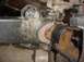 1992 Ford Bronco - Close-up view of heavily used and corroded vehicle suspension components.