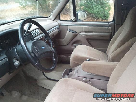 Interior view of a 1992 Ford F-Series truck showing the dashboard, steering wheel, and front seats