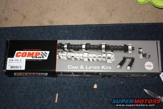 Box of Comp Cams cam and lifter kits with two camshafts and lifters visible