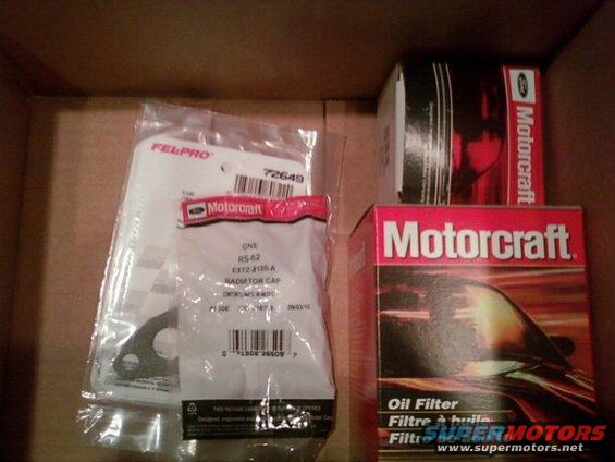 New oil filter, radiator cap, starter solenoid switch, and EGR gaskets.