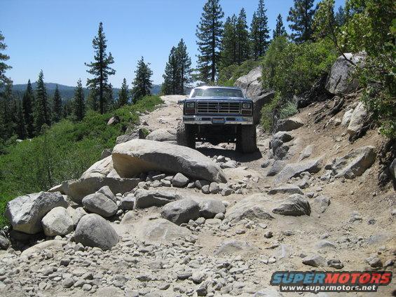 1980s Ford F-Series truck on rocky trail