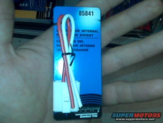 Blue package with white and red wires and a white connector