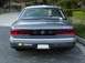 1992 Mercury Grand Marquis - Rear view of a 1992 Mercury Grand Marquis GS sedan parked outdoors.