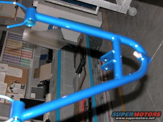Blue metal frame with mounting brackets, viewed from above