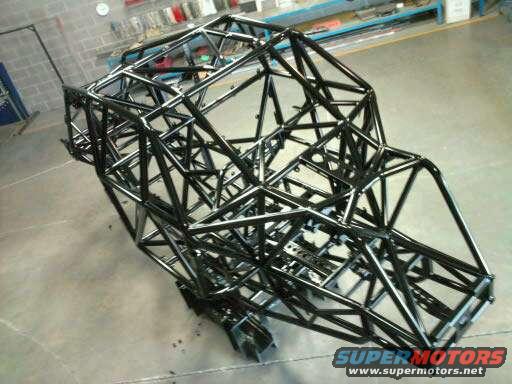 Black metal roll cage frame on concrete floor