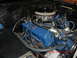 1973 Ford Bronco - Close-up of a Ford V8 engine, likely from a classic vehicle, showing engine components.