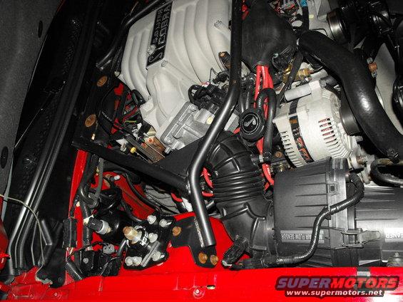 engine bay with "COBRA" intake manifold and "AIR FLOW SENSOR" label visible