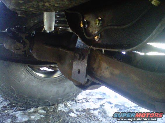 1994 Ford F-150 undercarriage with suspension and tire visible