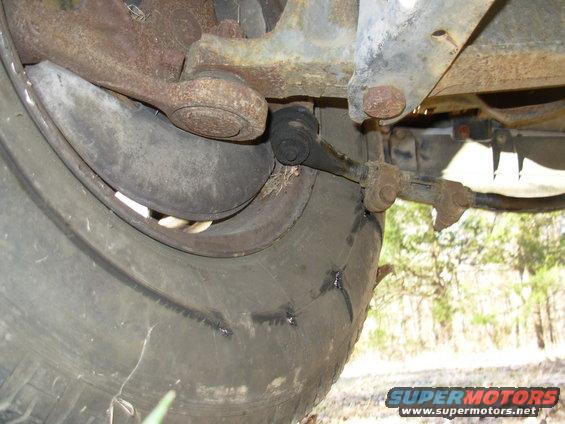 23blown.jpg I didn't realize it was bent badly enough to dig the adjuster bolt into the sidewall, blowing out the tire.  IDK why Ford specifies that the bolts be in this position, but here's a good reason for them NOT to be.

[url=https://www.supermotors.net/registry/media/440042][img]https://www.supermotors.net/getfile/440042/thumbnail/steeringlinkage.jpg[/img][/url] . [url=https://www.supermotors.net/registry/media/576903][img]https://www.supermotors.net/getfile/576903/thumbnail/alignmentfrontwheels.jpg[/img][/url] . [url=https://www.supermotors.net/registry/media/832841][img]https://www.supermotors.net/getfile/832841/thumbnail/swaybarf.jpg[/img][/url]