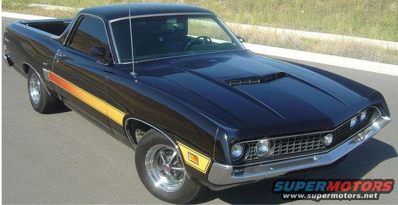 Black 1970 Ford Ranchero with yellow and orange side stripe, hood scoop, and chrome wheels