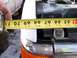 1989 Ford Bronco - A measuring tape is used to measure the width of a vehicle's fender. The date 02/15/2010 is visible.