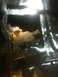 1993 Ford Bronco - The interior of a vehicle shows significant rust damage and a hole in the floor.