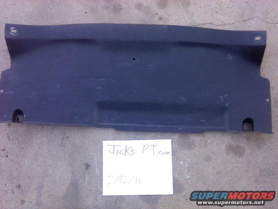 Dark plastic undertray panel with mounting holes