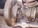1979 Ford Bronco - This image shows the front suspension components of a vehicle, including the steering linkage and part of the tire.