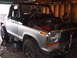 1979 Ford Bronco - This 1979 Ford Bronco is undergoing work in a garage, showing its engine bay.